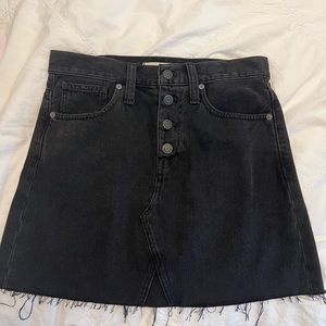 Black Madewell denim skirt with tags. Size 26. Never worn before.